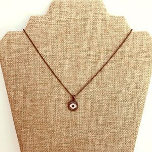 Evil eye crystal gun metal necklace